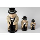 Six Royal Doulton 'Churchill' character jugs. Two graduated sets of three, each comprising large,