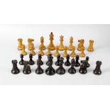 A Jacques Staunton carved and turned weighted wooden tournament size chess set, some pieces with