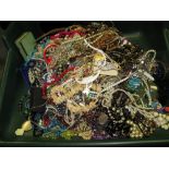 A bag containing a large quantity of costume jewellery. Many AF. Weight approximately 11.5kg. Due to