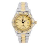 TAG HEUER - a mid-size 2000 Series bracelet watch. Stainless steel case with gold plated