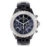 CHANEL - a J12 chronograph bracelet watch. Ceramic case with diamond set bezel and stainless steel