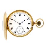 A half hunter pocket watch. 18ct yellow gold case with presentation engraving to cuvette, hallmarked