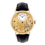 BREGUET - a gentleman's Tradition wrist watch. 18ct yellow gold case with exhibition case back.