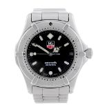 TAG HEUER - a mid-size 2000 Series bracelet watch. Stainless steel case with calibrated bezel.