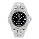 TAG HEUER - a gentleman's 2000 Exclusive bracelet watch. Stainless steel case with calibrated bezel.