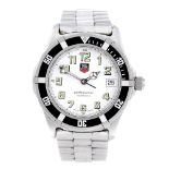 TAG HEUER - a gentleman's 2000 Series bracelet watch. Stainless steel case with calibrated bezel.