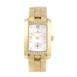 BAUME & MERCIER - a lady's Hampton bracelet watch. 18ct yellow gold factory diamond set case.