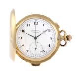 A full hunter repeater chronograph pocket watch by Lusina. Yellow metal case, stamped 18K 0.750.