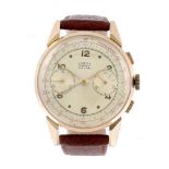 DOGMA - a gentleman's chronograph wrist watch. Rose metal case. Unsigned manual wind movement. Cream