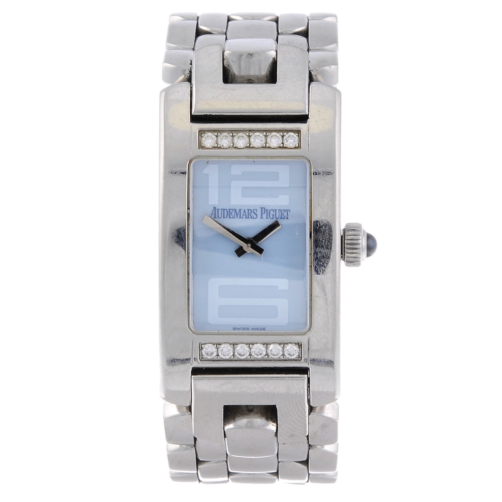 AUDEMARS PIGUET - a lady's Promesse bracelet watch. Stainless steel factory diamond set case.