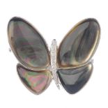 A mother-of-pearl and diamond butterfly pendant. The mother-of-pearl wings, with graduated