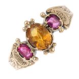 A late Victorian citrine and garnet-topped-doublet three-stone ring. The oval-shape citrine and