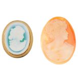 A 9ct gold hardstone brooch, with loose shell cameo. Each cameo depicting a woman in profile, the