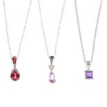 Seven gem-set pendants. To include a pink sapphire and diamond pendant, an amethyst single-stone