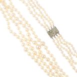 A cultured pearl four-row necklace. Comprising four graduated cultured pearl strands, measuring 8.