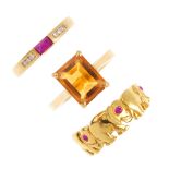 Three gem-set rings. To include an 18ct gold citrine single-stone ring, a ruby accent elephant motif