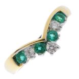 An 18ct gold emerald and diamond ring. The brilliant-cut diamond and circular-shape emerald chevron,