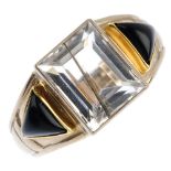 An 18ct gold gem-set ring. Of bi-colour design, the rectangular-shape rutilated quartz, with