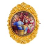 A late Victorian enamel brooch. Designed as a circular enamel panel, depicting a tavern scene,