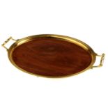 TIFFANY & CO - an early 20th century 18ct gold mounted, twin-handled wooden tray. Of oval form,