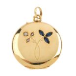 An early 20th century gold split-pearl and sapphire locket. Of circular outline, with split-pearl