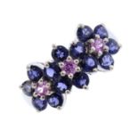 A 14ct gold amethyst and sapphire triple cluster ring. Designed as three circular-shape pink