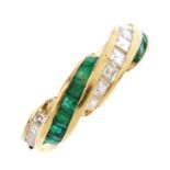 An 18ct gold emerald and diamond ring. Designed as square-shape diamond and emerald spiral bars,