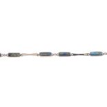 An 18ct gold labradorite and diamond bracelet. Designed as a series of rectangular labradorite