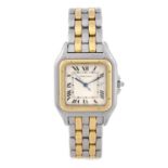 (551291-3-A) CARTIER - a Panthere bracelet watch. Stainless steel case with yellow metal bezel.