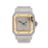 CARTIER - a Santos bracelet watch. Stainless steel case with yellow metal bezel. Reference 1566,