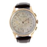 BAUME & MERCIER - a gentleman's chronograph wrist watch. Yellow metal case, stamped 18k with