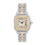 CARTIER - a Panthere bracelet watch. Stainless steel case with yellow metal bezel. Reference 1120 2,