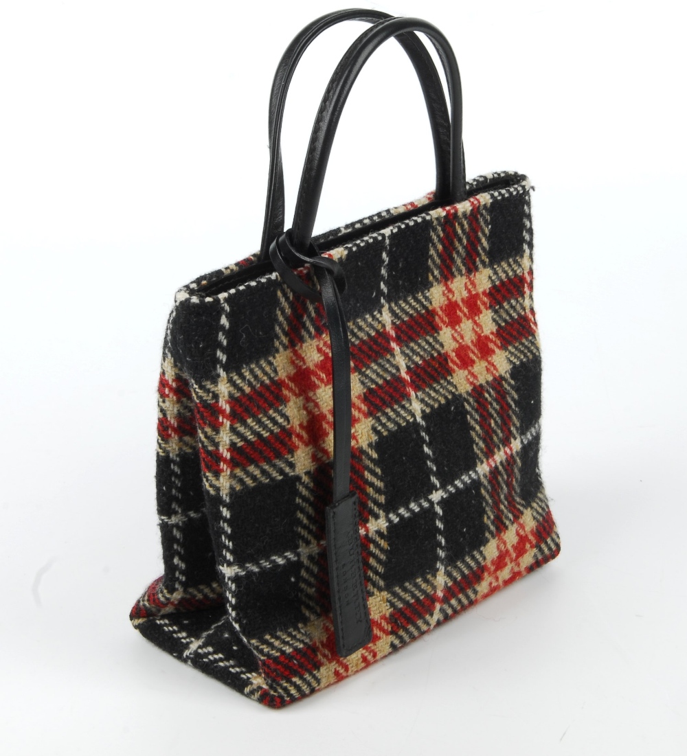 BURBERRY - a small woollen handbag. Featuring a black, cream and red plaid woollen exterior, with - Image 2 of 9