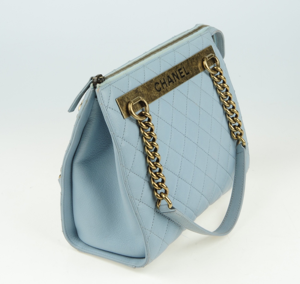 CHANEL - a quilted leather handbag. Designed with a pale blue quilted leather exterior and aged - Image 9 of 11