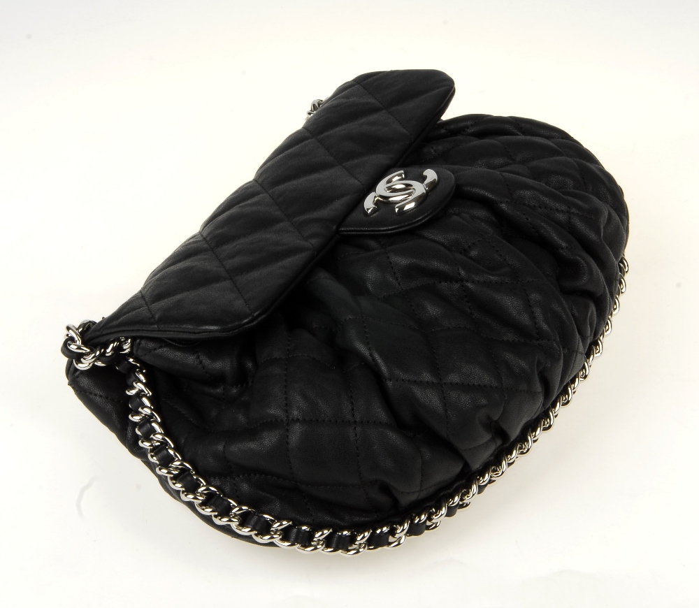 CHANEL - a Chain Around Flap handbag. Crafted from black quilted leather, featuring soft pleats to - Image 9 of 15