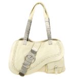 CHRISTIAN DIOR - a limited edition ivory metal Gaucho handbag. Designed with a smooth ivory lambskin