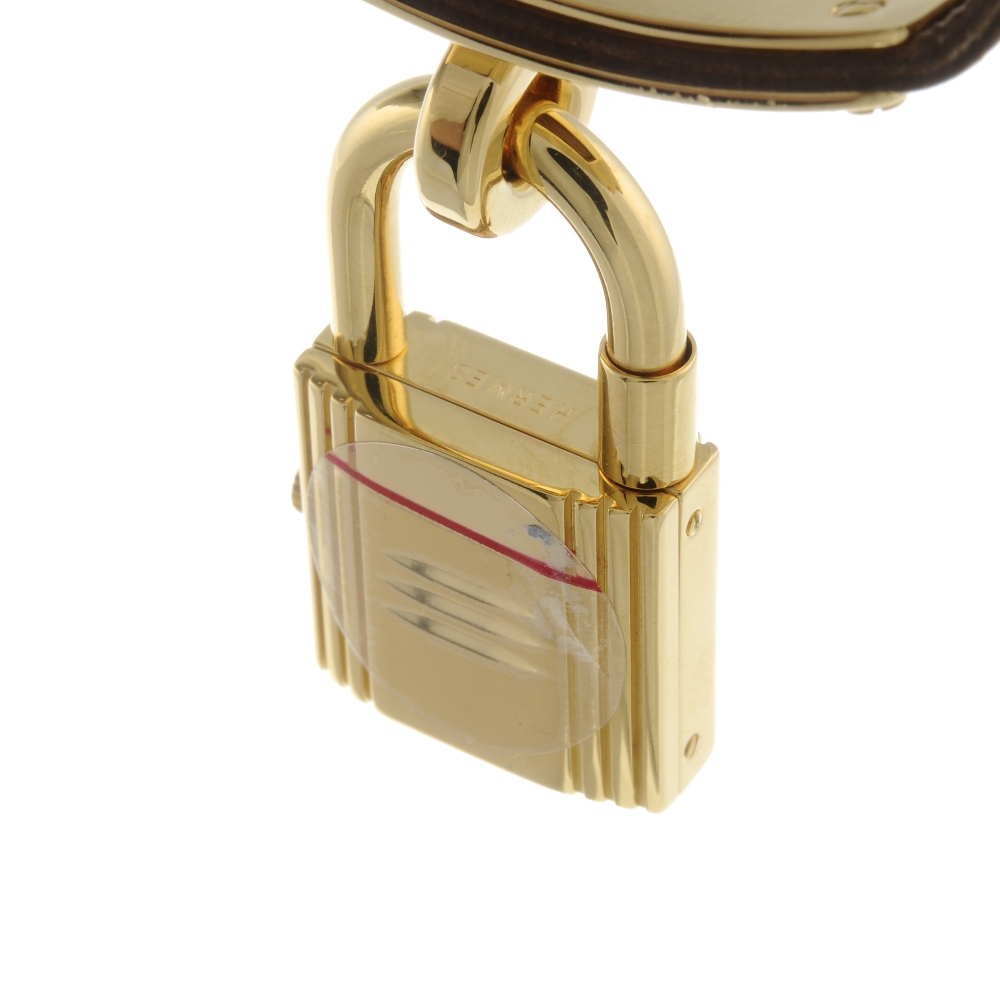 HERMÈS - a lady's Kelly wrist watch. Featuring a gold plated padlock form case, with a champagne - Image 3 of 7