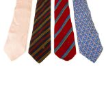 Four designer ties. To include two striped Céline ties, one predominantly red with diagonal green