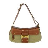 CHRISTIAN DIOR - a baguette handbag. Designed with a structured shape, featuring a khaki green