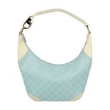 GUCCI - a mint green hobo handbag. Crafted from maker's mint green GG logo canvas, with cream
