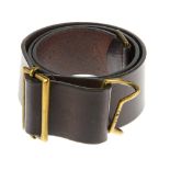 CHLOÉ - a brown leather belt. Crafted from dark brown rigid leather, featuring an antiqued brass