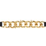 LOUIS VUITTON - a half chain bracelet. Designed with a central gold-tone curb chain, decorated