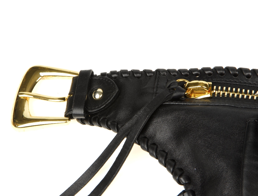 GIUSEPPE ZANOTTI - a fringed belt bag. Crafted from supple black nappa leather, with fringed - Bild 5 aus 11