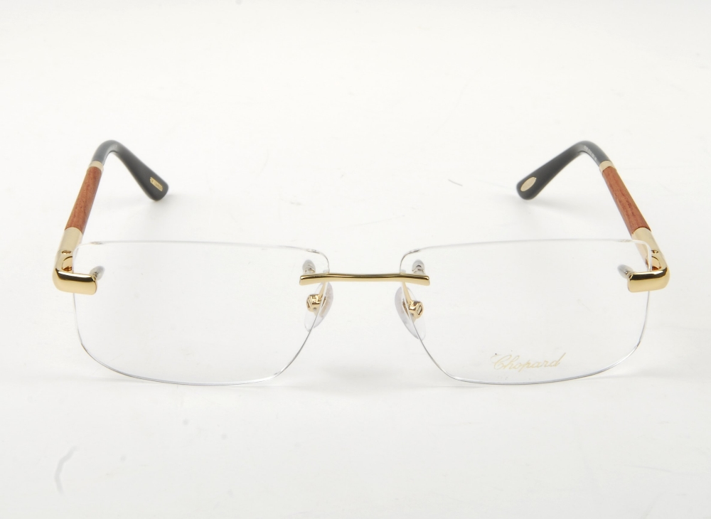 CHOPARD - a pair of rimless glasses. Featuring rimless demo print lenses, wooden arms with gold-tone - Bild 2 aus 9