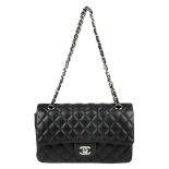 CHANEL - a Medium Classic Double Flap handbag. Designed with maker's iconic diamond quilted black