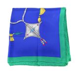 HERMÈS - a 'Parures Des Sables' silk scarf. Designed by Laurence Bourthoumieux, in rich blue,