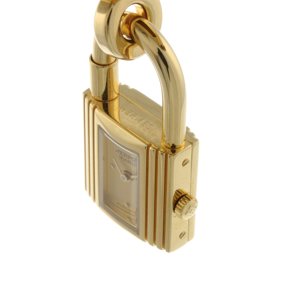 HERMÈS - a lady's Kelly wrist watch. Featuring a gold plated padlock form case, with a champagne - Image 5 of 7