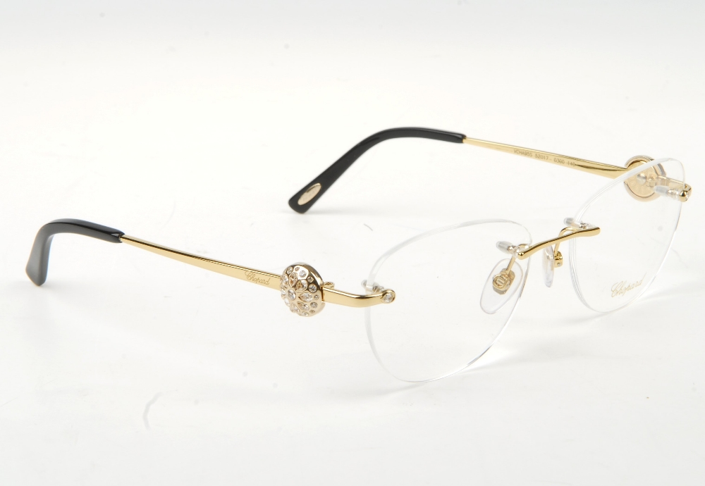 CHOPARD - a pair of rimless glasses. Featuring rimless demo print lenses, gold-tone metal arms and - Bild 4 aus 7
