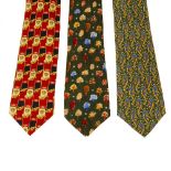 Three designer ties. To include a green Christian Dior tie with an organic design of gold vines, a