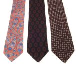 ARMANI - three ties. To include two burgundy ties, together with a pink and blue paisley patterned
